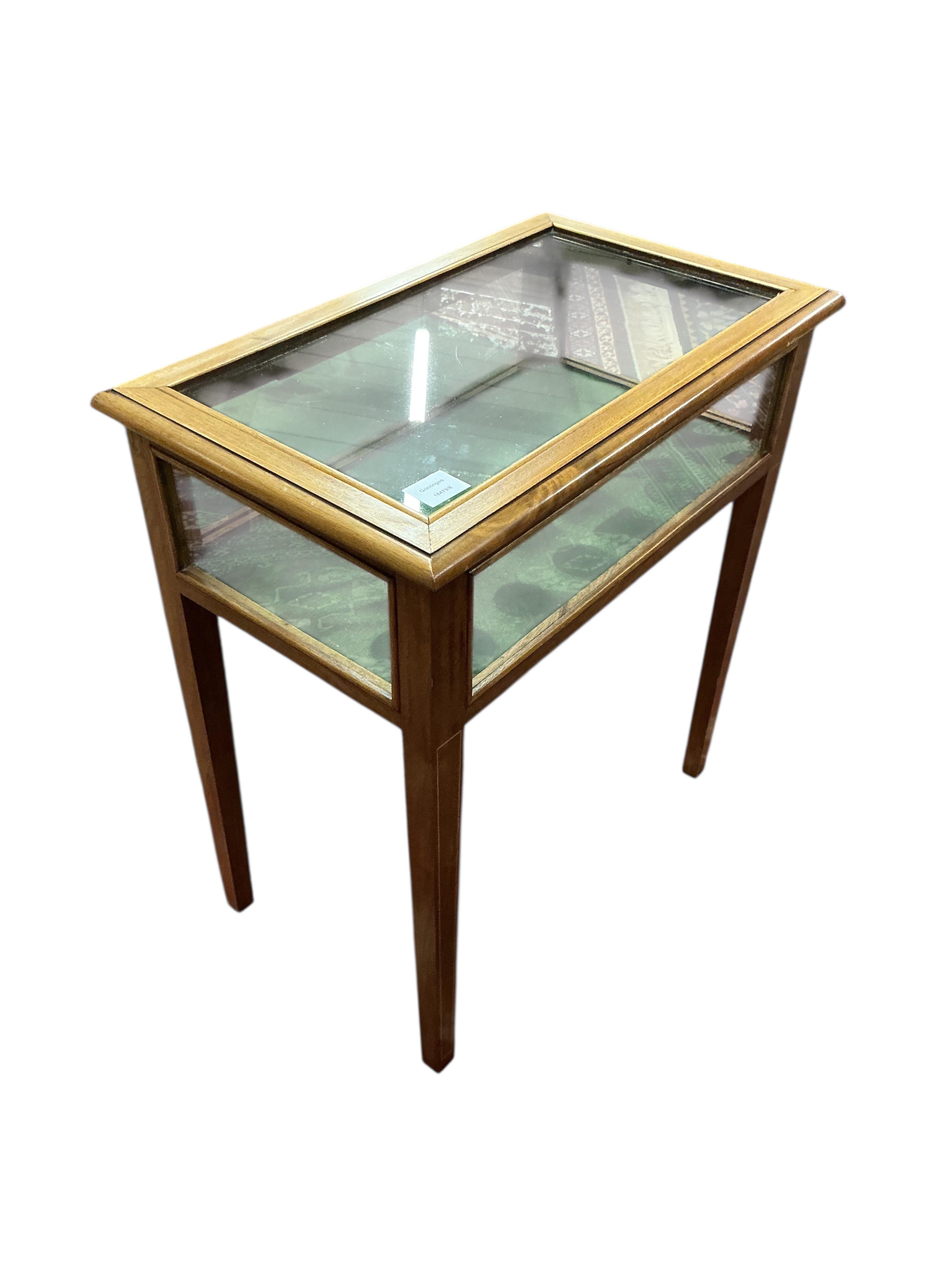 An Edwardian style rectangular mahogany bijouterie table, width 62cm, depth 38cm, height 68cm